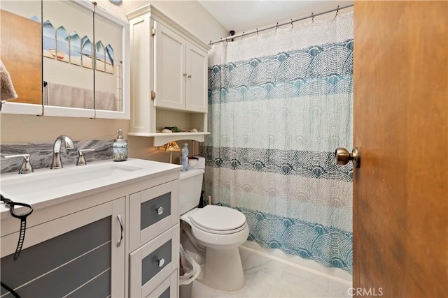 full bathroom featuring toilet, a shower with curtain, vanity, and marble finish floor