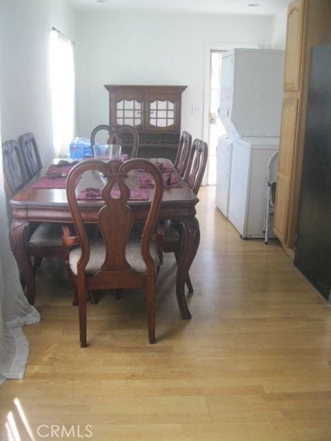2927 S Genesee Ave, Los Angeles, CA 90016 - dining space with light wood-style flooring