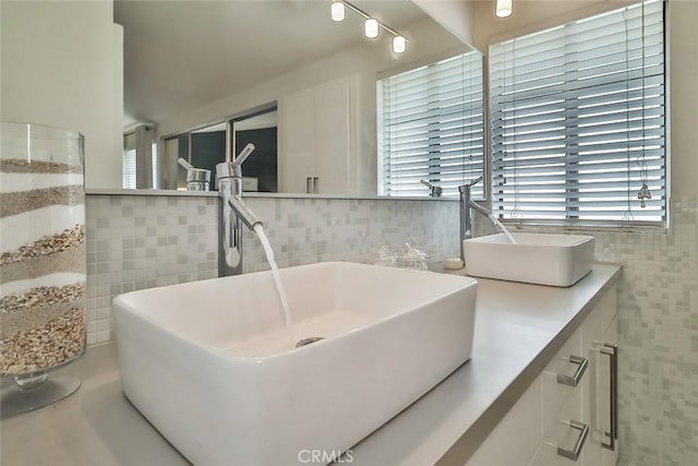 21025 Lemarsh St Unit G39, Chatsworth, CA 91311 - bathroom featuring tile walls and double vanity