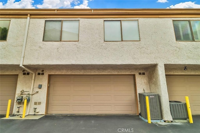 21025 Lemarsh St Unit G39, Chatsworth, CA 91311 - view of front of home featuring stucco siding and central AC