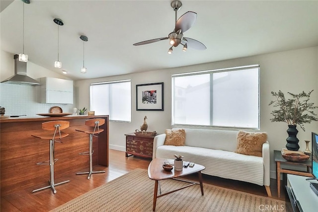21025 Lemarsh St Unit G39, Chatsworth, CA 91311 - living area featuring wood finished floors, a ceiling fan, and lofted ceiling