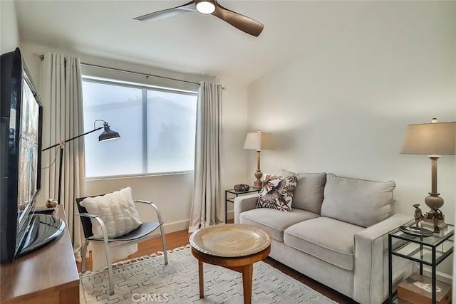 21025 Lemarsh St Unit G39, Chatsworth, CA 91311 - living room featuring wood finished floors, a ceiling fan, and baseboards