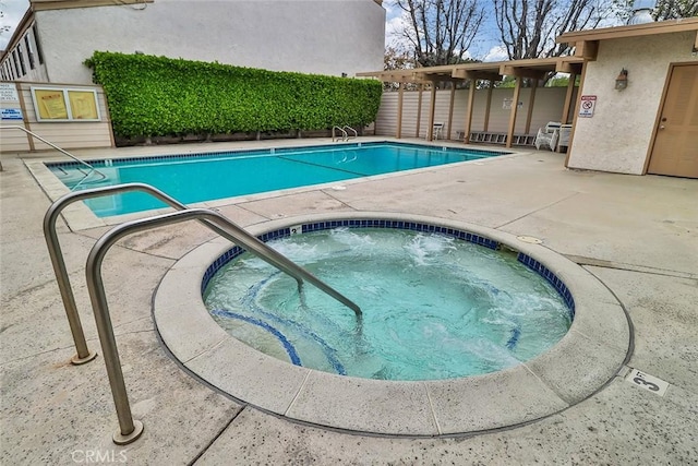 21025 Lemarsh St Unit G39, Chatsworth, CA 91311 - community pool featuring a patio and a hot tub