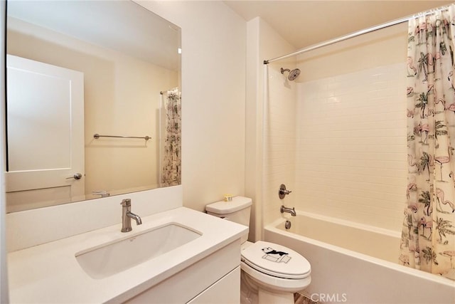 full bath featuring shower / bath combo, toilet, and vanity