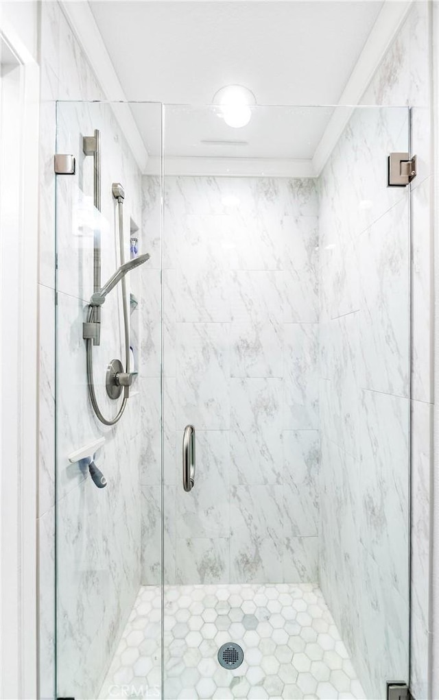 full bathroom featuring a shower stall