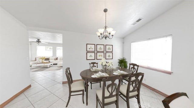 8740 S Loop Blvd, California City, CA 93505 - dining room featuring lofted ceiling, a notable chandelier, light tile patterned floors, baseboards, and visible vents