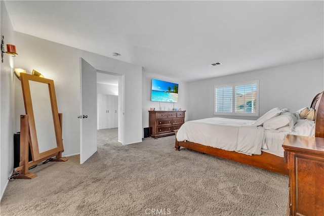 carpeted bedroom with visible vents