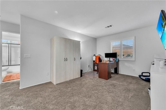 office area featuring carpet and visible vents