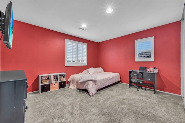 carpeted bedroom with visible vents, recessed lighting, and baseboards