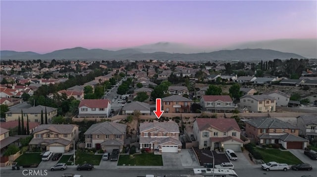aerial view with a mountain view and a residential view