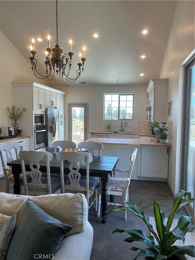 1160 Easy Ln, Nipomo, CA 93444 - dining area with a chandelier and recessed lighting