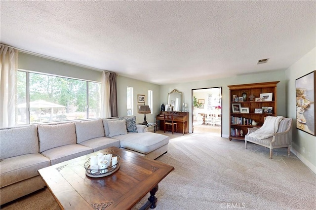1160 Easy Ln, Nipomo, CA 93444 - living area with carpet, a textured ceiling, and baseboards