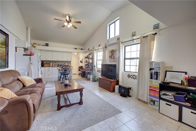 1160 Easy Ln, Nipomo, CA 93444 - living room with a ceiling fan, light tile patterned floors, and high vaulted ceiling