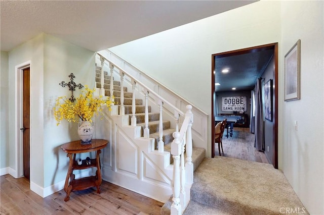 1160 Easy Ln, Nipomo, CA 93444 - staircase featuring wood finished floors, baseboards, and a textured ceiling
