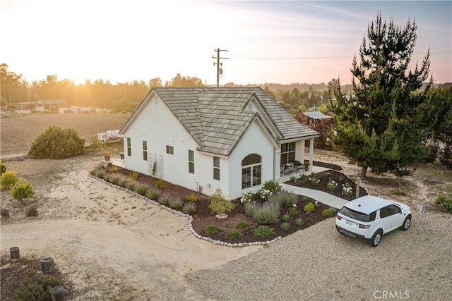 1160 Easy Ln, Nipomo, CA 93444 - view of side of property featuring stucco siding and a tiled roof
