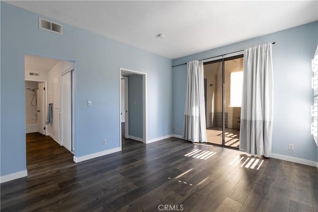3913 N Virginia Rd Unit 207, Long Beach, CA 90807 - interior space with dark wood finished floors, visible vents, and baseboards