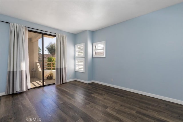 3913 N Virginia Rd Unit 207, Long Beach, CA 90807 - spare room featuring dark wood-style flooring and baseboards