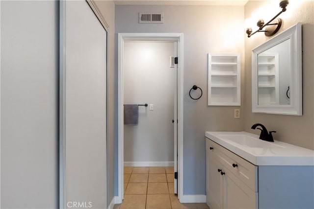 3913 N Virginia Rd Unit 207, Long Beach, CA 90807 - bathroom featuring visible vents, vanity, tile patterned flooring, and baseboards