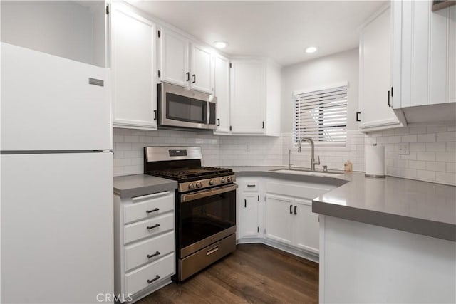 3913 N Virginia Rd Unit 207, Long Beach, CA 90807 - kitchen featuring white cabinetry, stainless steel appliances, and a sink