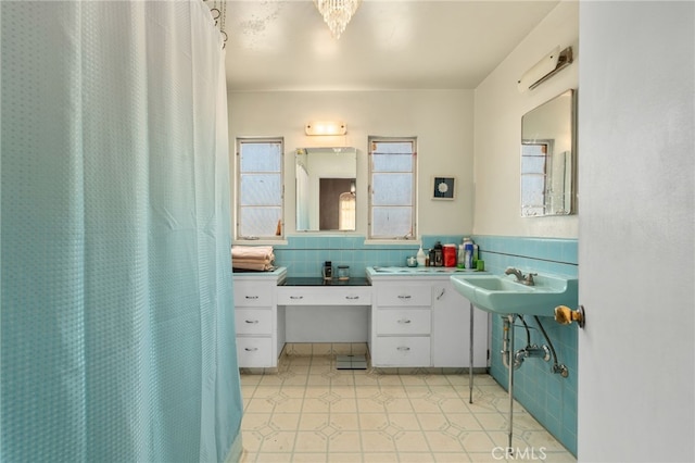 650 N Acacia, Rialto, CA 92376 - full bathroom featuring wainscoting and tile walls