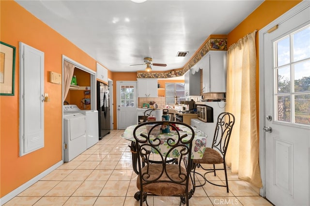 650 N Acacia, Rialto, CA 92376 - dining room with washing machine and clothes dryer, light tile patterned flooring, and ceiling fan