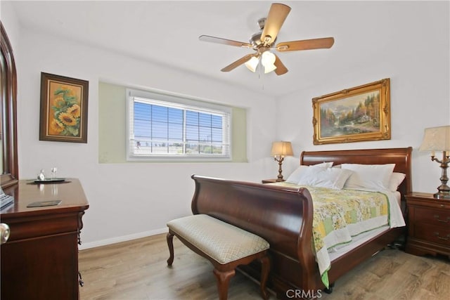 8913 Bexley Dr, Pico Rivera, CA 90660 - bedroom with baseboards, a ceiling fan, and wood finished floors