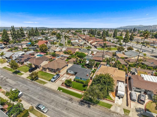 8913 Bexley Dr, Pico Rivera, CA 90660 - drone / aerial view featuring a residential view and a mountain view