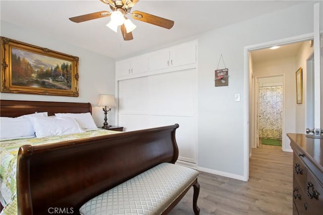 8913 Bexley Dr, Pico Rivera, CA 90660 - bedroom featuring baseboards, ceiling fan, a closet, and light wood-type flooring