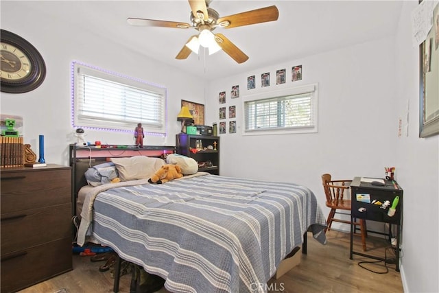 8913 Bexley Dr, Pico Rivera, CA 90660 - bedroom with ceiling fan and wood finished floors