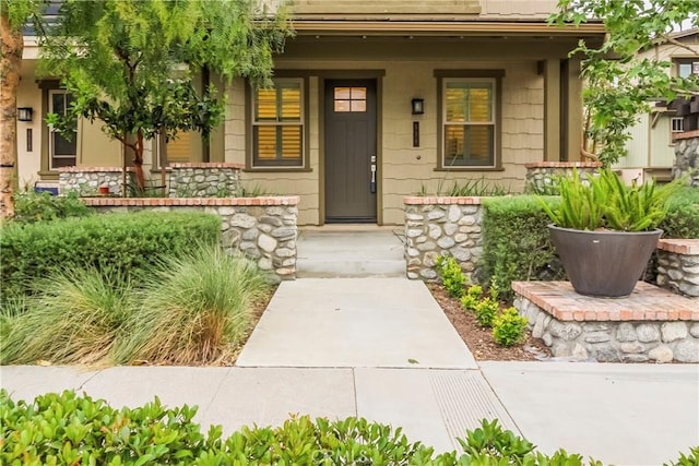556 W Baseline Rd, Claremont, CA 91711 - view of exterior entry with covered porch and stone siding