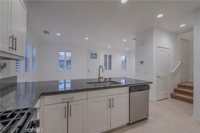 556 W Baseline Rd, Claremont, CA 91711 - kitchen featuring dark stone countertops, recessed lighting, appliances with stainless steel finishes, a sink, and visible vents