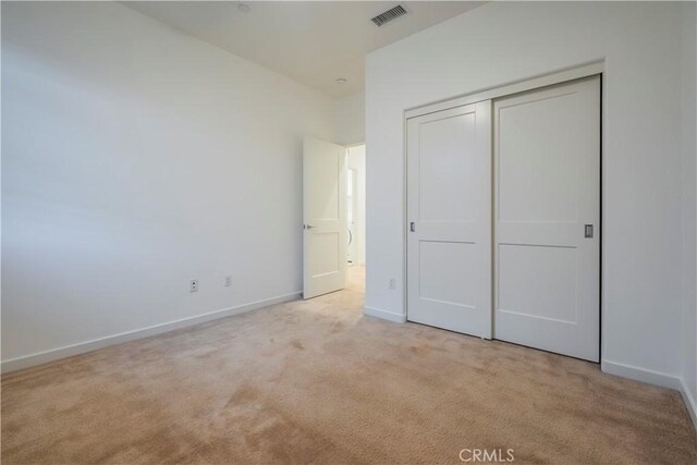 556 W Baseline Rd, Claremont, CA 91711 - unfurnished bedroom with a closet, visible vents, carpet, and baseboards
