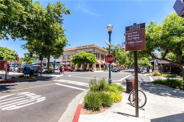 556 W Baseline Rd, Claremont, CA 91711 - view of street featuring curbs, sidewalks, street lights, and traffic signs