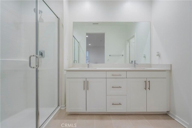556 W Baseline Rd, Claremont, CA 91711 - full bathroom featuring a stall shower, tile patterned flooring, double vanity, and a sink