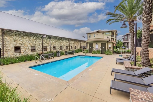 556 W Baseline Rd, Claremont, CA 91711 - community pool featuring a patio and fence
