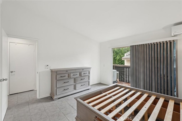 1251 S Meadow Ln Unit 154, Colton, CA 92324 - bedroom featuring a wall mounted air conditioner, light tile patterned floors, and access to exterior