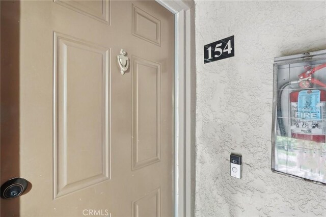 1251 S Meadow Ln Unit 154, Colton, CA 92324 - details with stucco siding