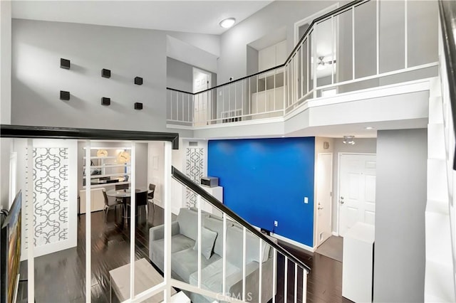 1541 Westcastle, West Covina, CA 91791 - stairs with a high ceiling, wood finished floors, and baseboards