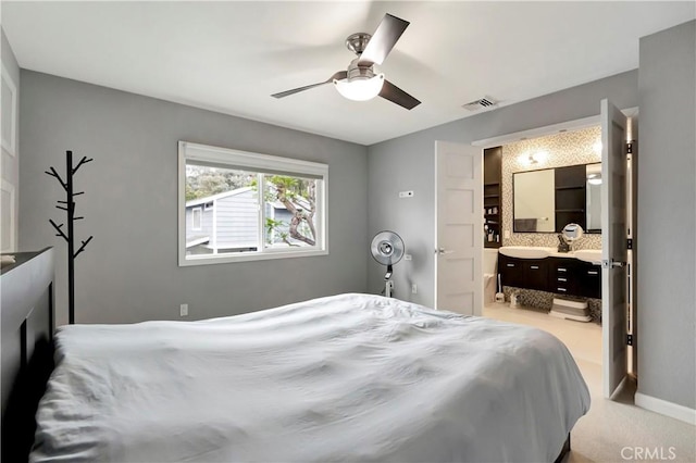 1541 Westcastle, West Covina, CA 91791 - bedroom with light carpet, ensuite bathroom, ceiling fan, and baseboards