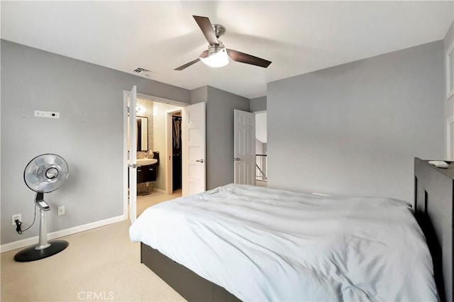 1541 Westcastle, West Covina, CA 91791 - bedroom featuring light colored carpet, baseboards, a ceiling fan, and ensuite bath