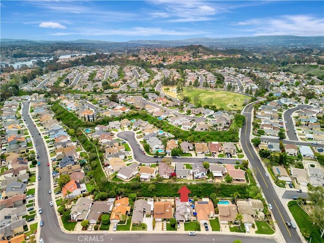 birds eye view of property with a residential view