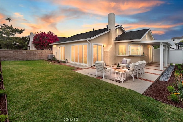 rear view of house featuring central air condition unit, a fenced backyard, an outdoor living space, and a patio area
