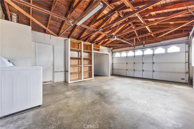 20908 New Hampshire Ave, Torrance, CA 90502 - garage with washer / clothes dryer, wood ceiling, and a garage door opener