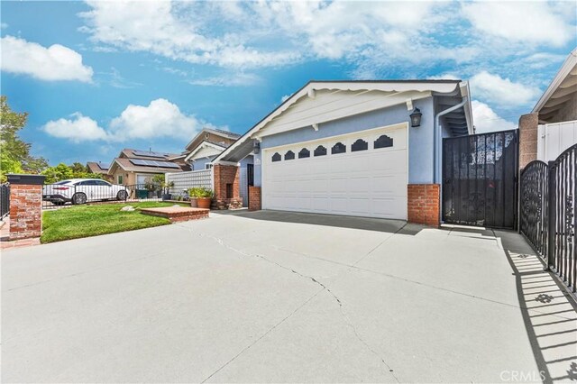 20908 New Hampshire Ave, Torrance, CA 90502 - ranch-style home with driveway, brick siding, a garage, fence, and a gate