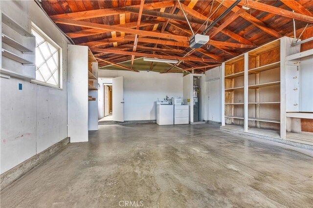 20908 New Hampshire Ave, Torrance, CA 90502 - garage featuring washer and dryer, wood ceiling, and a garage door opener
