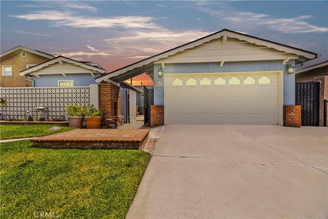 20908 New Hampshire Ave, Torrance, CA 90502 - single story home with brick siding, driveway, and an attached garage