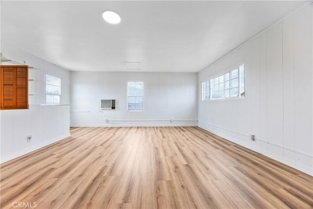 20908 New Hampshire Ave, Torrance, CA 90502 - unfurnished living room featuring wood finished floors and baseboards