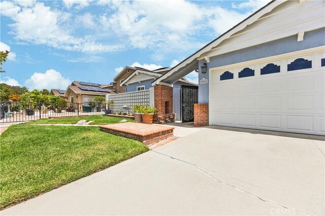 20908 New Hampshire Ave, Torrance, CA 90502 - view of side of home with concrete driveway, brick siding, and a garage