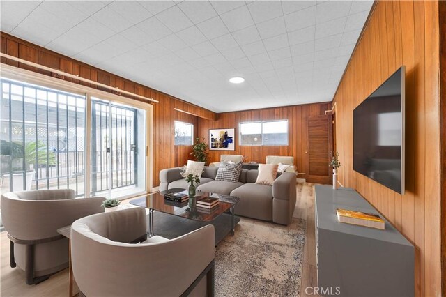 20908 New Hampshire Ave, Torrance, CA 90502 - living room featuring wooden walls and recessed lighting