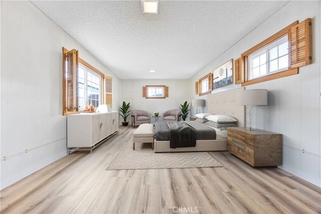 20908 New Hampshire Ave, Torrance, CA 90502 - bedroom with wood finished floors and a textured ceiling